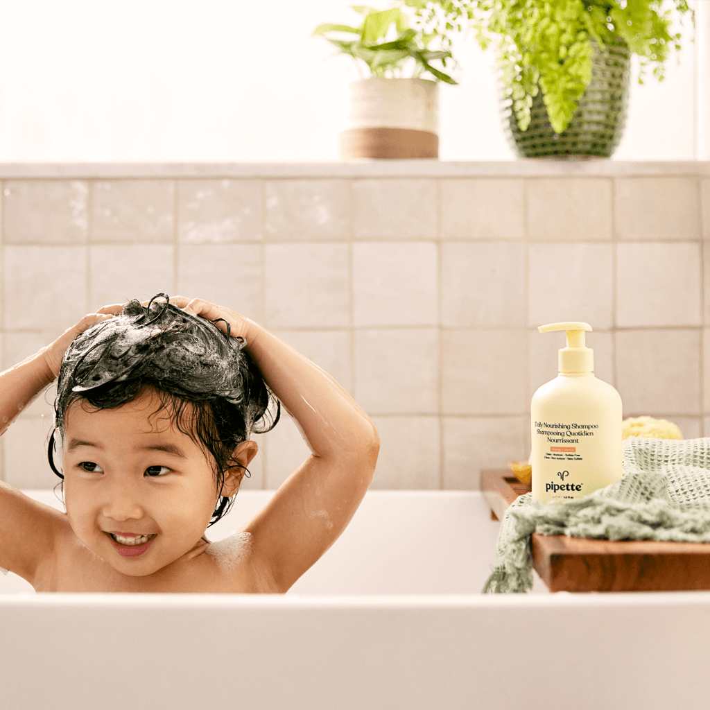 Kiddo applying Daily Nourishing Shampoo on Hair